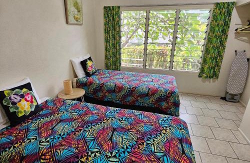 Ngatangiia House | Mango Cottage with AC, Unlimited Wifi and Private pool